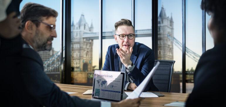 Business owner reviewing trade license renewal documents in Dubai office
